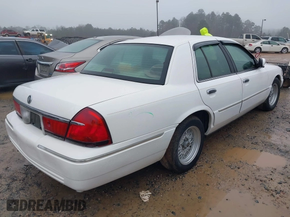 2001 Mercury Grand Marquis LS with VIN 2MEFM75W41X672360, listed as a IAAI auction lot 41418594 with 73,717 mi miles and . Bid and sale history available at DreamBid. Image 4.
