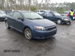 2006 Scion tC with VIN JTKDE177260092306, listed as a IAAI auction lot 41614438 with 223,208 mi miles. Bid and sale history available at carsss.com. Image 1.