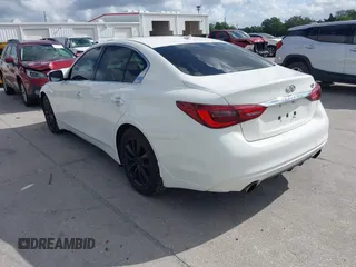 2021 Infiniti Q50 Pure with VIN JN1EV7APXMM702002, listed as a IAAI auction lot 41947553 with 41,654 mi miles and . Bid and sale history available at DreamBid. Image 3.