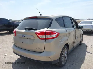 2018 Ford C-Max SE with VIN 1FADP5AU8JL102227, listed as a IAAI auction lot 42062394 with 122,943 mi miles. Bid and sale history available at carsss.com. Image 4.