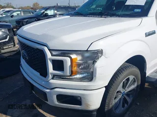 2019 Ford F-150 XL with VIN 1FTEW1CPXKKF00869, listed as a IAAI auction lot 41197442 with 77,487 mi miles and . Bid and sale history available at DreamBid. Image 6.