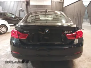 2018 BMW 4 Series 430i xDrive with VIN WBA4J3C56JBL03844, listed as a IAAI auction lot 40864200 with 56,115 mi miles and . Bid and sale history available at DreamBid. Image 17.