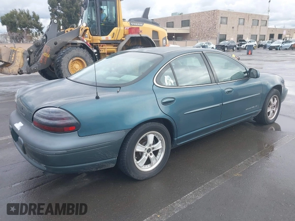 1997 Pontiac Grand Prix SE with VIN 1G2WJ52K0VF249961, listed as a IAAI auction lot 41512770 with 168,408 mi miles. Bid and sale history available at carsss.com. Image 4.