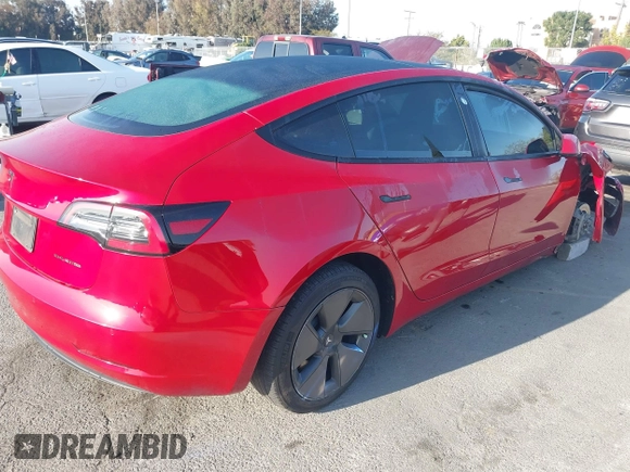2021 Tesla Model 3 Long Range with VIN 5YJ3E1EB1MF071634, listed as a IAAI auction lot 41964321 with 39,596 mi miles. Bid and sale history available at carsss.com. Image 4.