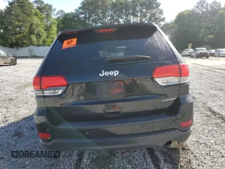 2018 Jeep Grand Cherokee Laredo E with VIN 1C4RJEAGXJC246874, listed as a Copart auction lot 56722005 with 101,493 mi miles and Salvage title. Bid and sale history available at DreamBid. Image 6.