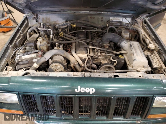 1997 Jeep Cherokee Country with VIN 1J4FJ78S8VL577137, listed as a Copart auction lot 48034405 with 156,154 mi miles and Salvage Title. Bid and sale history available at carsss.com. Image 11.