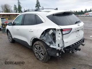 2021 Ford Escape SEL with VIN 1FMCU9H91MUB35409, listed as a IAAI auction lot 41900711 with 19,295 mi miles and . Bid and sale history available at DreamBid. Image 3.