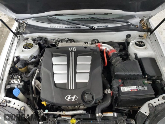 2006 Hyundai Tiburon GT z VIN KMHHN65F96U203924, wystawiony jako Copart lot #43624185 z przebiegiem 120 403 mil mil oraz Szkoda całkowita • Salvage title. Historia ofert i sprzedaży dostępna na DreamBid. Obrazek 11.