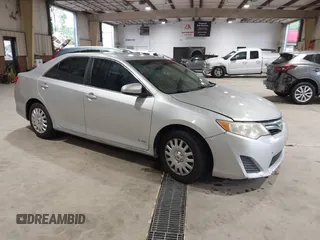 2012 Toyota Camry L z VIN 4T1BF1FK1CU080262, wystawiony jako IAAI lot #42247347 z przebiegiem 194 987 mil mil oraz . Historia ofert i sprzedaży dostępna na DreamBid. Obrazek 1.