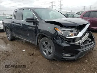 2023 Honda Ridgeline RTL with VIN 5FPYK3F59PB001216, listed as a Copart auction lot 57147385 with 43,452 mi miles and Salvage title. Bid and sale history available at DreamBid. Image 4.