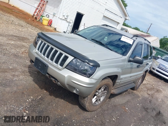 2004 Jeep Grand Cherokee Laredo with VIN 1J4GW48N84C234194, listed as a IAAI auction lot 42388702 with 237,643 mi miles and . Bid and sale history available at DreamBid. Image 2.