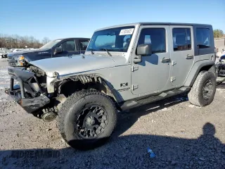 2007 Jeep Wrangler Unlimited X with VIN 1J4GB39167L102038, listed as a Copart auction lot 41905605 with 184,679 mi miles and Salvage title. Bid and sale history available at DreamBid. Image 1.