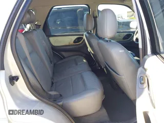2005 Ford Escape Hybrid with VIN 1FMCU95H45KD16867, listed as a IAAI auction lot 41661311 with 206,698 mi miles. Bid and sale history available at carsss.com. Image 8.