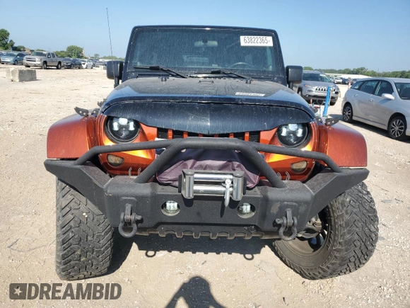 2012 Jeep Wrangler Unlimited Sport with VIN 1C4BJWDG0CL200802, listed as a Copart auction lot 63822365 with 116,501 mi miles and Salvage title. Bid and sale history available at DreamBid. Image 5.