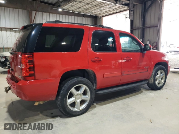 2011 Chevrolet Tahoe LS with VIN 1GNSCAE00BR320455, listed as a Copart auction lot 54782325 with 202,936 mi miles and Salvage title. Bid and sale history available at DreamBid. Image 3.