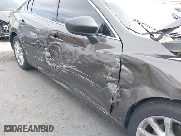 2016 Mazda 6 i Sport with VIN JM1GJ1U57G1425243, listed as a IAAI auction lot 41901771 with 135,155 mi miles and . Bid and sale history available at DreamBid. Image 6.