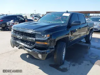 2018 Chevrolet Silverado 1500 LT with VIN 3GCPCRECXJG441953, listed as a IAAI auction lot 41977376 with 126,401 mi miles. Bid and sale history available at carsss.com. Image 2.
