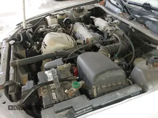 2000 Toyota Camry CE z VIN JT2BG22K5Y0475792, wystawiony jako IAAI lot #42865500 z przebiegiem 256 933 mil mil oraz . Historia ofert i sprzedaży dostępna na DreamBid. Obrazek 18.