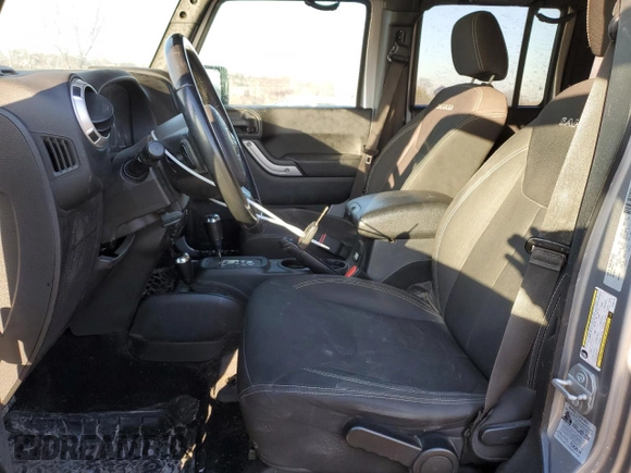 2018 Jeep Wrangler JK Unlimited Sahara with VIN 1C4HJWEGXJL922218, listed as a Copart auction lot 42282815 with 124,637 mi miles and Salvage Title. Bid and sale history available at carsss.com. Image 7.