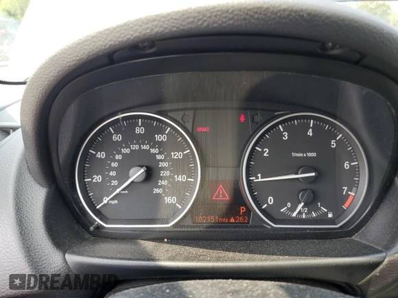 2011 BMW 1 Series 128i with VIN WBAUP7C57BVP21318, listed as a Copart auction lot 60479055 with 102,151 mi miles and Salvage title. Bid and sale history available at DreamBid. Image 9.