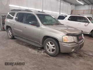 2003 GMC Envoy SLT with VIN 1GKET16S736104096, listed as a IAAI auction lot 42590071 with 249,954 mi miles and . Bid and sale history available at DreamBid. Image 1.