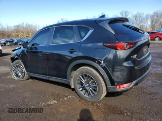 2019 Mazda CX-5 Touring with VIN JM3KFBCM7K0628309, listed as a Copart auction lot 49575435 with 92,687 mi miles and Salvage Title. Bid and sale history available at carsss.com. Image 2.