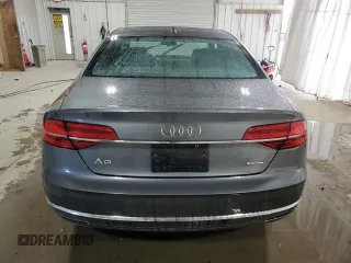 2015 Audi A8 z VIN WAUJGAFDXFN008499, wystawiony jako Copart lot #87658385 z przebiegiem 103 175 mil mil oraz Szkoda całkowita • Salvage title. Historia ofert i sprzedaży dostępna na DreamBid. Obrazek 6.