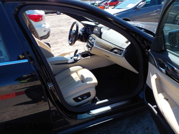 2018 BMW 5 Series 530i with VIN WBAJA5C53JWA39248, listed as a IAAI auction lot 41816164 with 80,747 mi miles and . Bid and sale history available at DreamBid. Image 5.