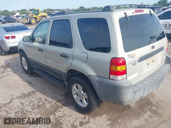 2005 Ford Escape XLT with VIN 1FMYU03145KA40360, listed as a IAAI auction lot 42511276 with 151,269 mi miles and . Bid and sale history available at DreamBid. Image 3.