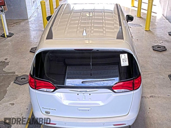 2017 Chrysler Pacifica Touring with VIN 2C4RC1DG5HR764942, listed as a IAAI auction lot 42255421 with 64,381 mi miles and . Bid and sale history available at DreamBid. Image 11.