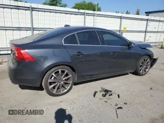 2015 Volvo S60 T5 Drive-E Premier с VIN YV140MFK2F1350695, выставлен на аукционе Copart как лот 53275725 с пробегом 98 962 миль миль и Списание • Salvage title. История ставок и продаж доступна на DreamBid. Изображение 3.