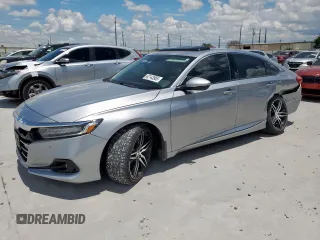 2021 Honda Accord Touring with VIN 1HGCV2F91MA023711, listed as a Copart auction lot 62143955 with 32,359 mi miles and Salvage title. Bid and sale history available at DreamBid. Image 1.