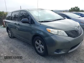 2014 Toyota Sienna L with VIN 5TDZK3DC6ES421278, listed as a IAAI auction lot 41178679 with 202,823 mi miles. Bid and sale history available at carsss.com. Image 1.