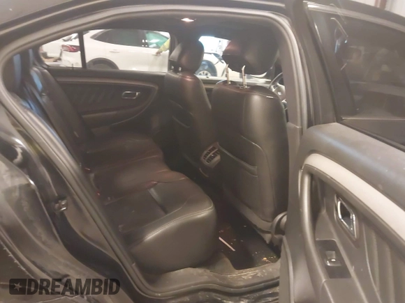 2015 Ford Taurus SEL with VIN 1FAHP2H80FG133240, listed as a IAAI auction lot 41897873 with 189,059 mi miles. Bid and sale history available at carsss.com. Image 8.