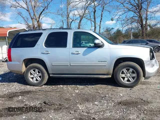 2012 GMC Yukon SLT with VIN 1GKS2CE02CR133683, listed as a IAAI auction lot 41375435 with 197,634 mi miles. Bid and sale history available at carsss.com. Image 13.
