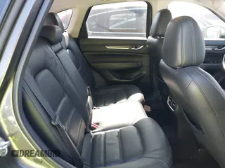 2020 Mazda CX-5 Grand Touring with VIN JM3KFADM3L1812649, listed as a IAAI auction lot 42575393 with 102,118 mi miles and . Bid and sale history available at DreamBid. Image 8.