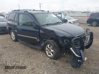 2007 GMC Envoy SLE with VIN 1GKDT13S372158038, listed as a IAAI auction lot 42103078 with 119,954 mi miles. Bid and sale history available at carsss.com. Image 6.