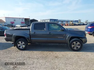 2011 Toyota Tacoma PreRunner with VIN 3TMJU4GN6BM117602, listed as a IAAI auction lot 41483053 with 209,591 mi miles and . Bid and sale history available at DreamBid. Image 13.