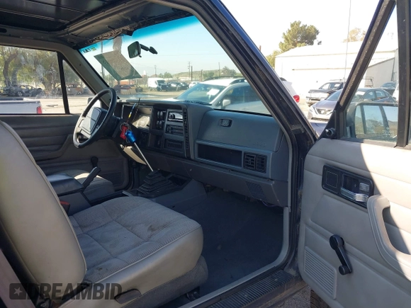 1996 Jeep Cherokee with VIN 1J4FT27S2TL156171, listed as a IAAI auction lot 41578009 with 161,095 mi miles and . Bid and sale history available at DreamBid. Image 5.
