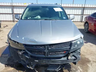 2015 Dodge Journey Crossroad with VIN 3C4PDCGB2FT692057, listed as a IAAI auction lot 41992747 with 94,212 mi miles and . Bid and sale history available at DreamBid. Image 13.