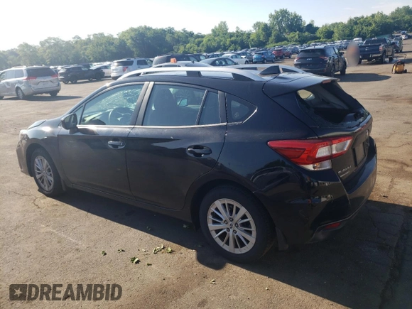 2018 Subaru Impreza Premium with VIN 4S3GTAB68J3739274, listed as a Copart auction lot 62193185 with 58,518 mi miles and Salvage title. Bid and sale history available at DreamBid. Image 2.