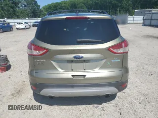 2013 Ford Escape SE with VIN 1FMCU0GX0DUD65115, listed as a Copart auction lot 61616295 with 175,375 mi miles and Salvage title. Bid and sale history available at DreamBid. Image 6.