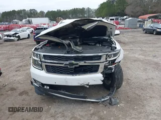 2020 Chevrolet Tahoe LT with VIN 1GNSKBKC2LR253012, listed as a IAAI auction lot 41870002 with 127,789 mi miles and . Bid and sale history available at DreamBid. Image 12.