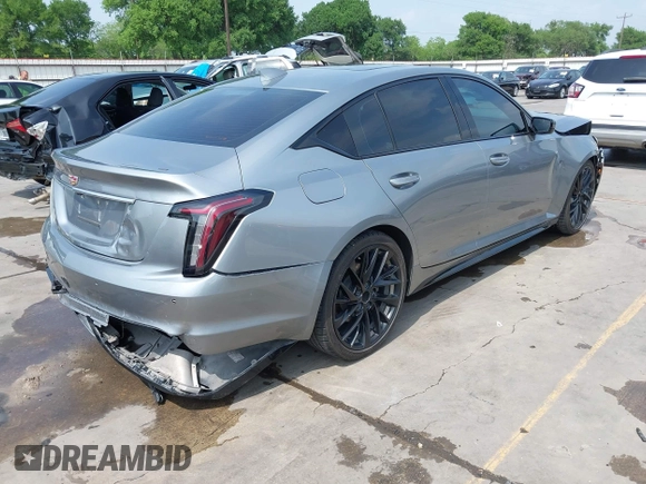 2023 Cadillac CT5 Sport z VIN 1G6DP5RK7P0113696, wystawiony jako IAAI lot #41904906 z przebiegiem 89 191 mil mil oraz . Historia ofert i sprzedaży dostępna na DreamBid. Obrazek 4.