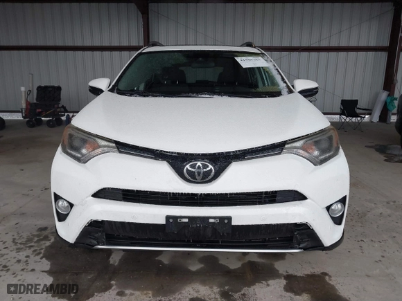 2018 Toyota RAV4 XLE with VIN JTMRFREV6JD222115, listed as a IAAI auction lot 41505367 with 118,126 mi miles. Bid and sale history available at carsss.com. Image 12.