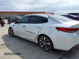 2016 Kia Optima SXL Turbo with VIN 5XXGV4L26GG015874, listed as a IAAI auction lot 42127366 with 166,970 mi miles. Bid and sale history available at carsss.com. Image 14.