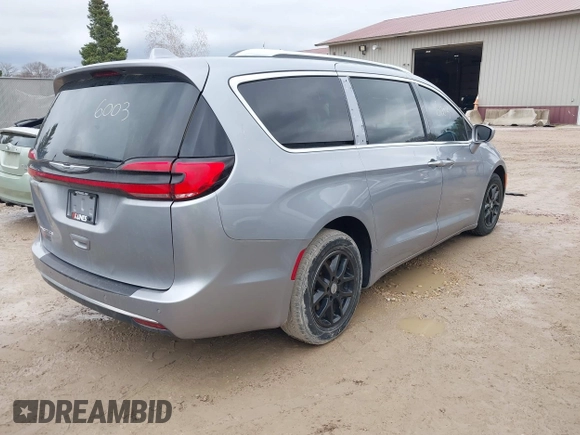 2021 Chrysler Pacifica Touring L z VIN 2C4RC1BG0MR531936, wystawiony jako IAAI lot #42176003 z przebiegiem 109 633 mil mil oraz . Historia ofert i sprzedaży dostępna na DreamBid. Obrazek 4.