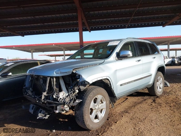 2012 Jeep Grand Cherokee Limited with VIN 1C4RJFBG2CC317363, listed as a IAAI auction lot 41689903 with 158,020 mi miles. Bid and sale history available at carsss.com. Image 2.