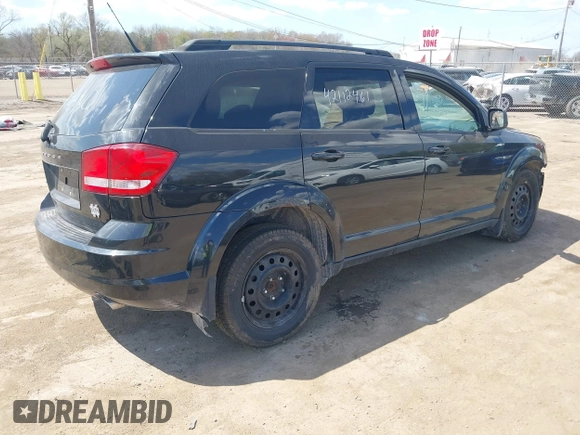 2011 Dodge Journey Mainstreet with VIN 3D4PH1FG2BT516953, listed as a IAAI auction lot 42112461 with 203,909 mi miles and . Bid and sale history available at DreamBid. Image 4.