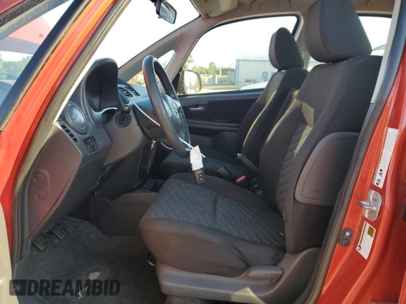 2009 Suzuki SX4 Touring AWD z VIN JS2YB417X96201551, wystawiony jako Copart lot #56630665 z przebiegiem 109 297 mil mil oraz Szkoda całkowita • Salvage title. Historia ofert i sprzedaży dostępna na DreamBid. Obrazek 7.